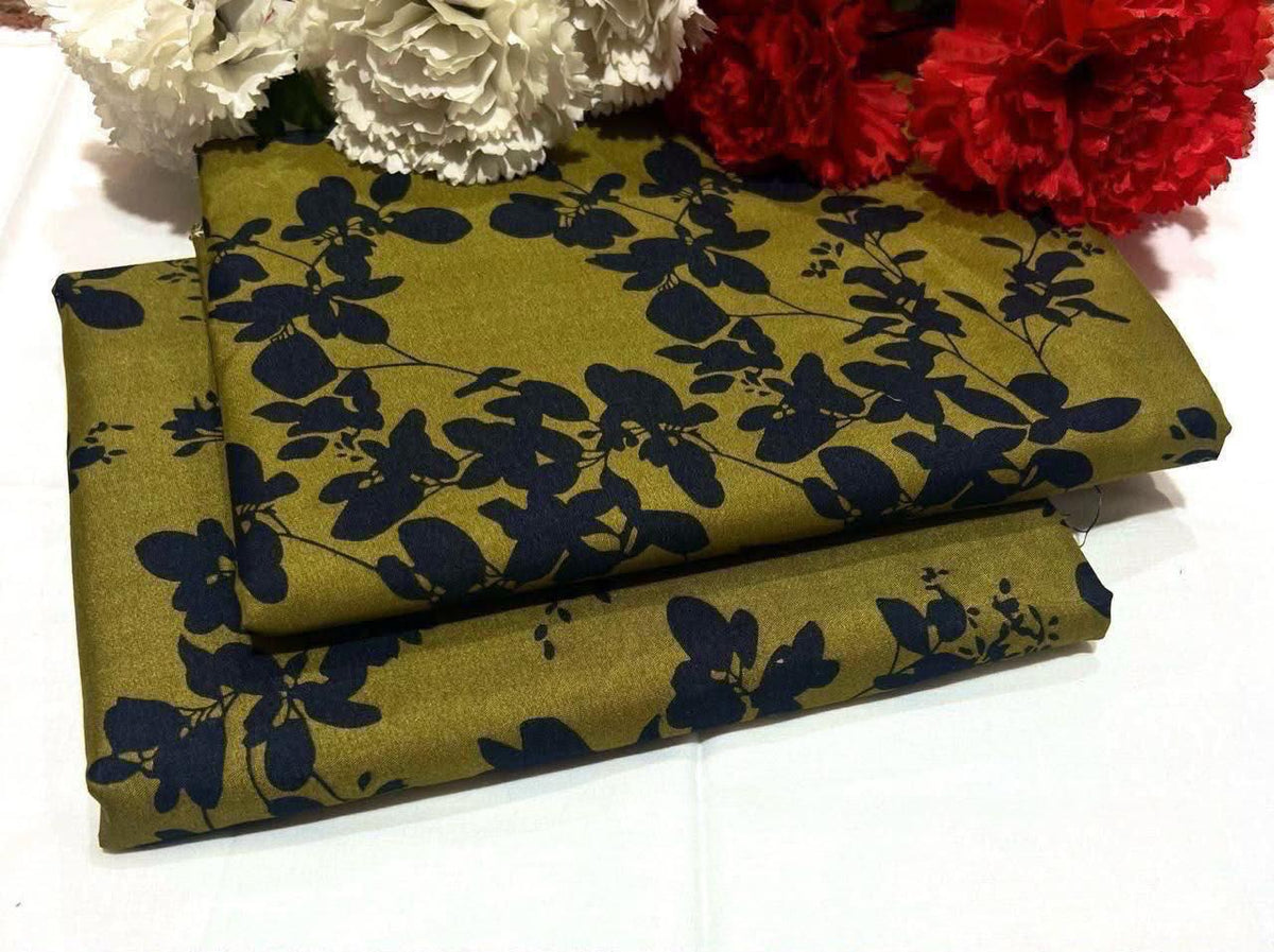 2 piece suit in green swatches with black floral pattern