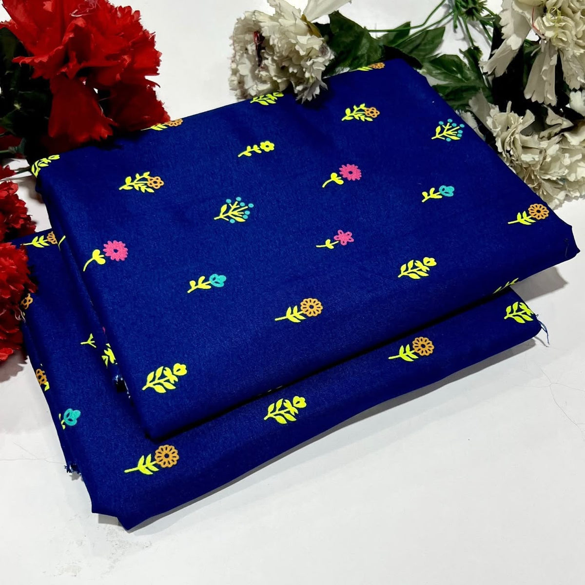 2 piece suit in Blue with colorful floral patterns