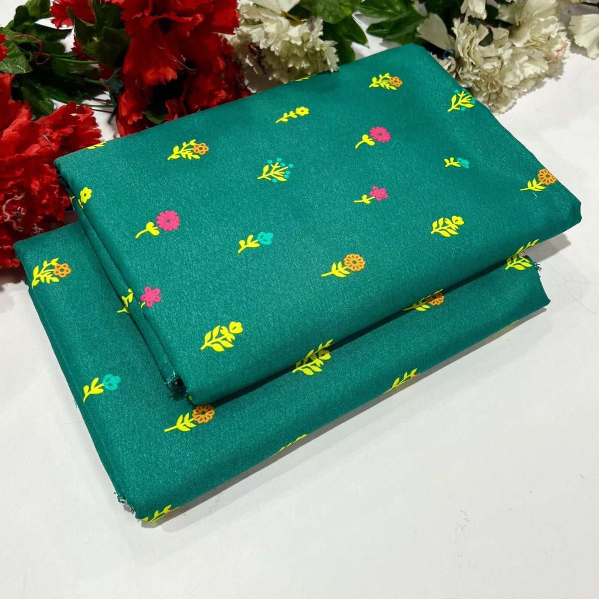 2 piece suit in green with a small floral print