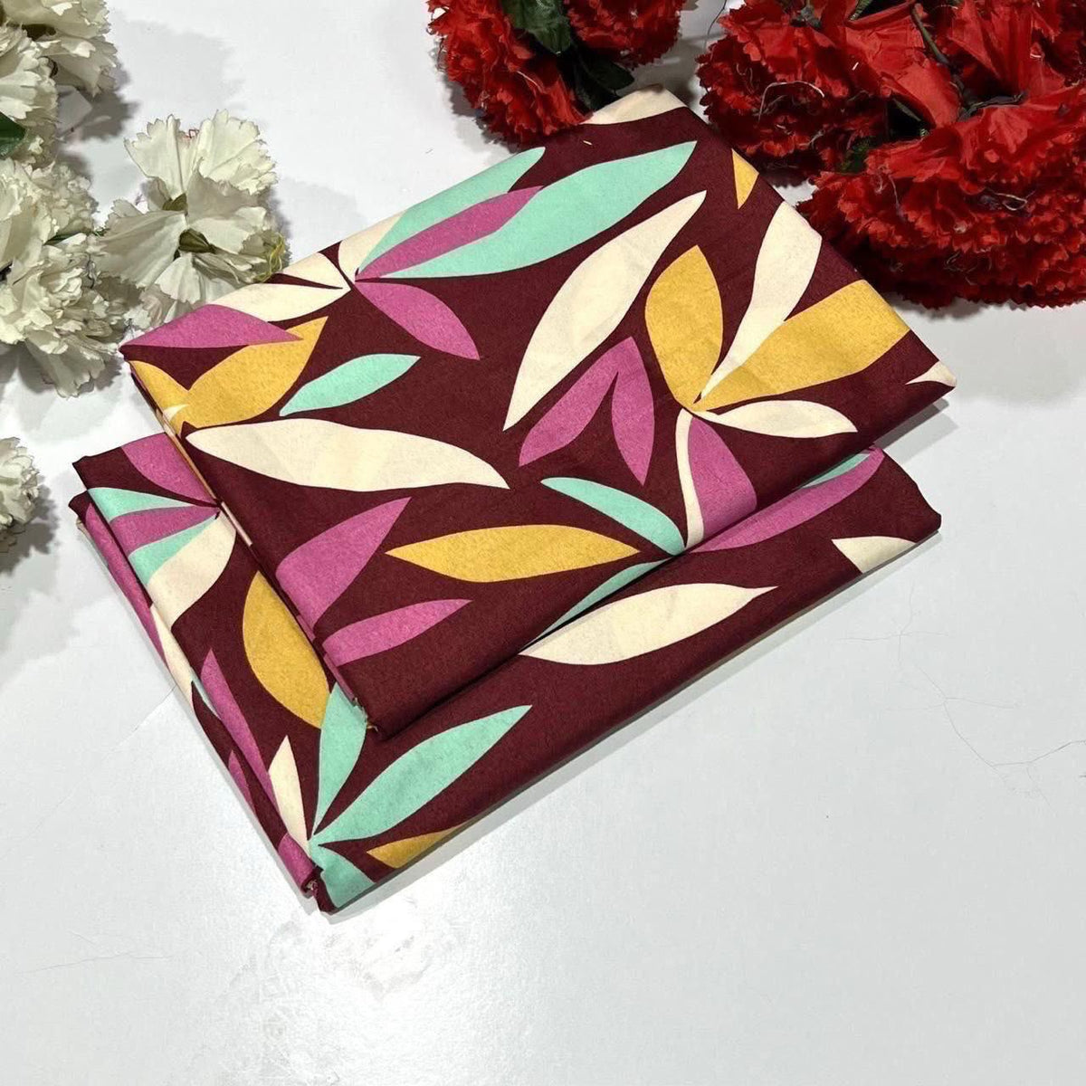 2 piece suit in colorful leaf pattern 