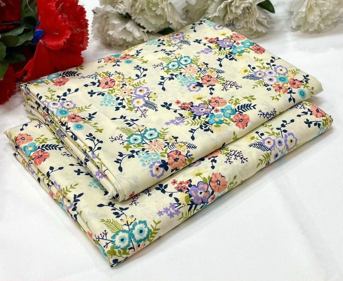 2 piece suit in cream-colored with a colorful floral print