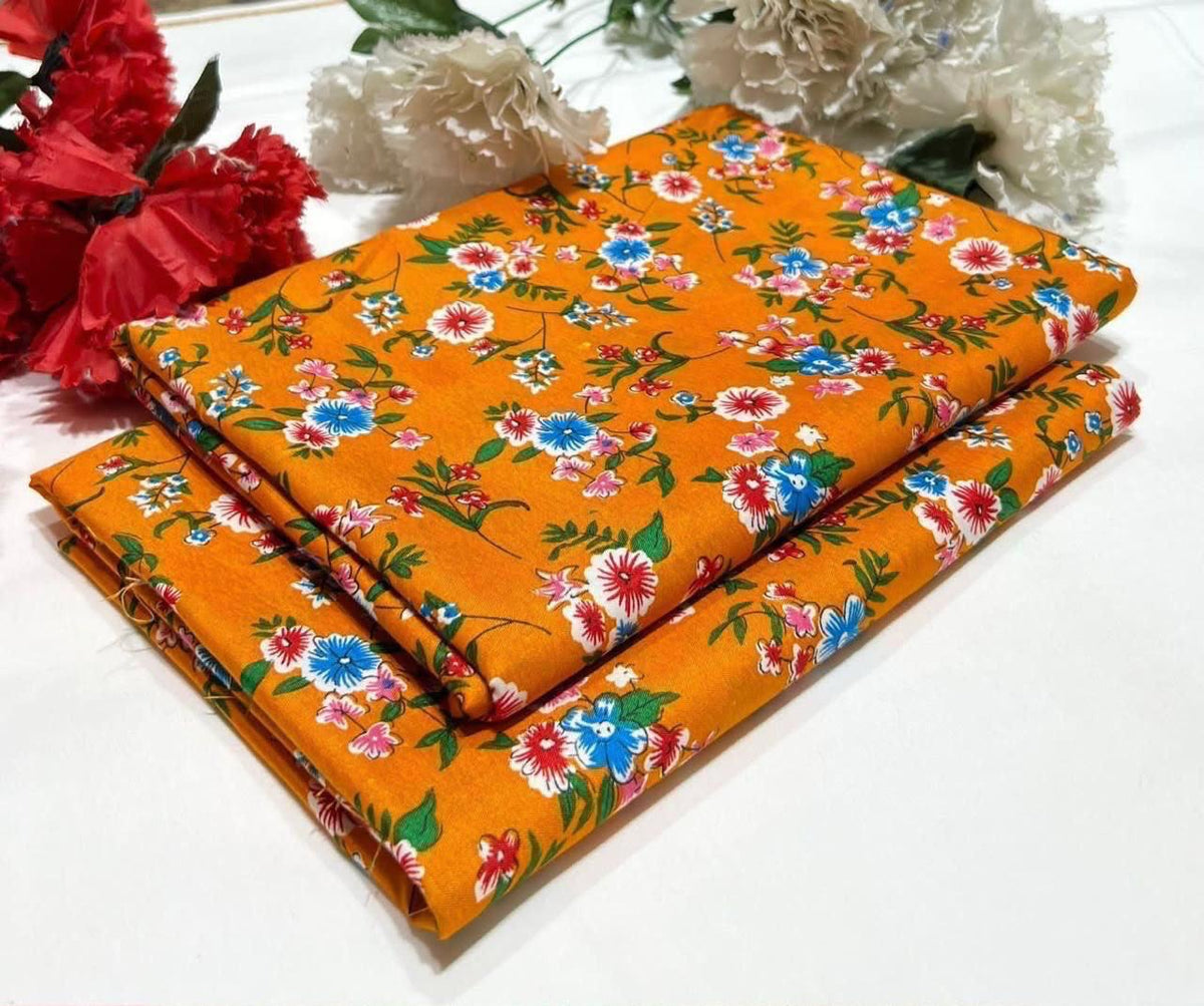 2 piece suit in orange with colorful floral pattern