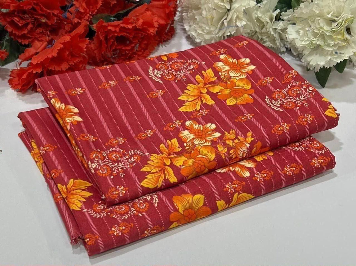 2 piece suit in red with vertical stripes and a large orange floral print