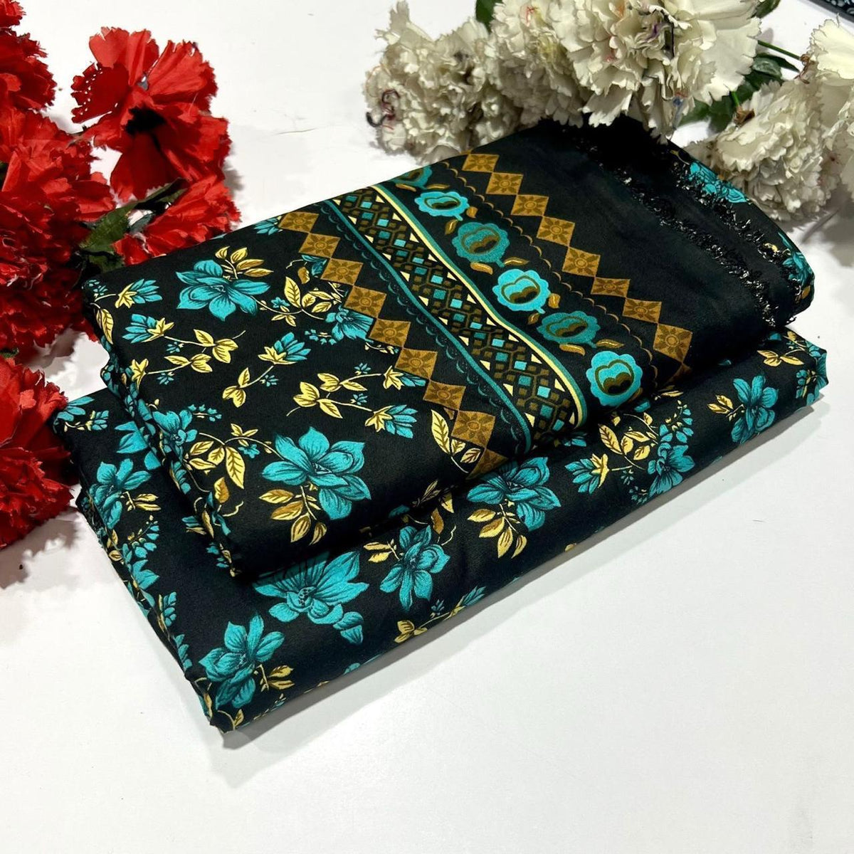 Ladies 2 piece suit in black  with floral and geometric patterns